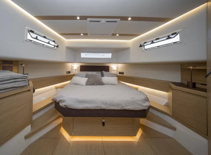  Yacht Photos Pics Luxurious interior of 2024 Pardo Yachts P50, featuring a cozy, modern bedroom design.