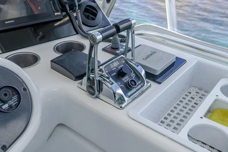 Chillax Yacht Photos Pics Control panel of 2005 Riviera 51 Flybridge yacht with Garmin navigation system.