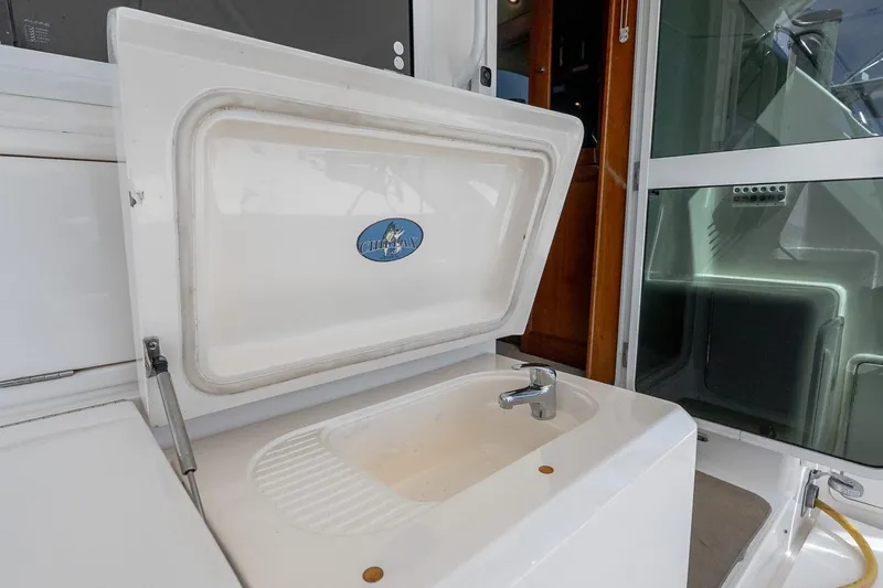 Chillax Yacht Photos Pics Open sink on 2005 Riviera 51 Flybridge yacht, featuring a compact design.