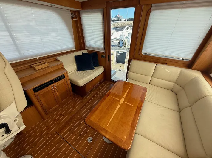 We''ll Sea Yacht Photos Pics Interior of 2011 Sabre 40 Sedan yacht with elegant wood and leather seating.