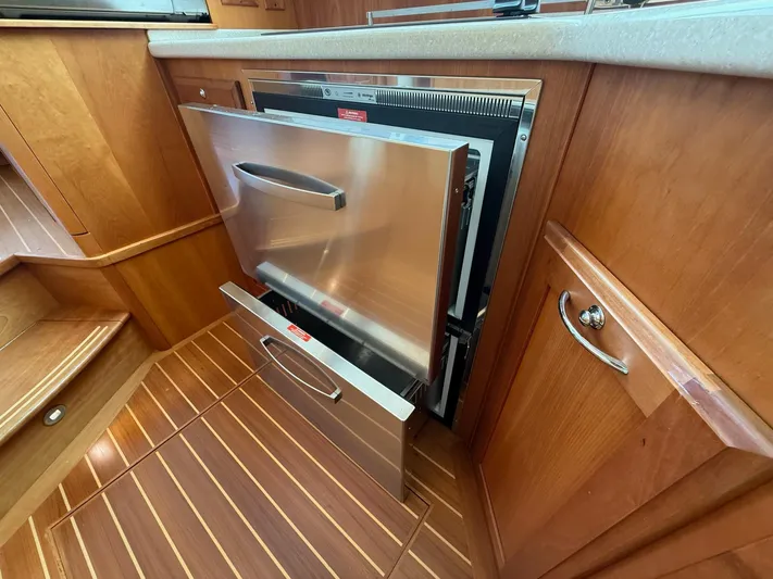 We''ll Sea Yacht Photos Pics Stainless steel dishwasher in 2011 Sabre 40 Sedan yacht kitchen interior.