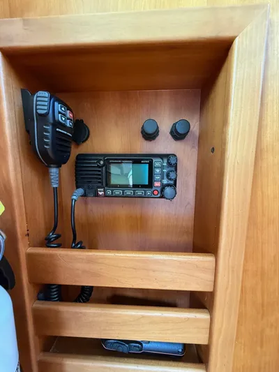 We''ll Sea Yacht Photos Pics 2011 Sabre 40 Sedan radio equipment in wooden compartment.