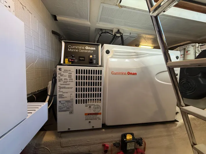 We''ll Sea Yacht Photos Pics Cummins Onan marine generator in 2011 Sabre 40 Sedan engine room.