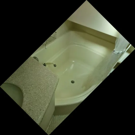 Elusive Yacht Photos Pics Bathtub in 1997 Carver 500 Cockpit Motor Yacht, featuring beige interior and countertop.