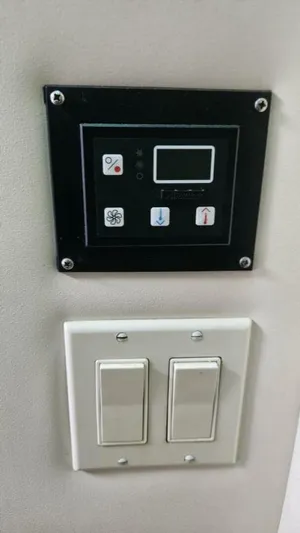 Elusive Yacht Photos Pics Control panel and switches on a 1997 Carver 500 Cockpit Motor Yacht.