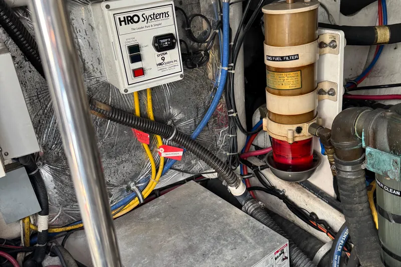 Dark And Stormy Yacht Photos Pics Engine room of 2000 Tiara Yachts 3500 Express with HRO Systems and fuel filter.