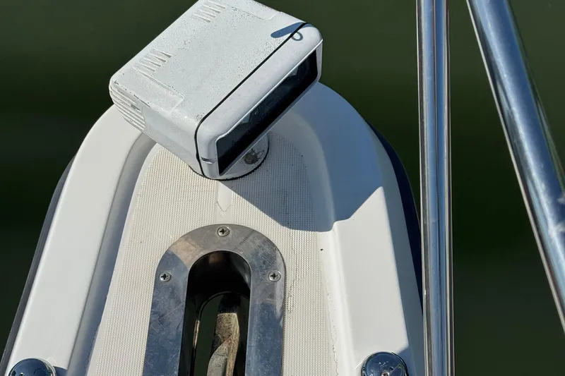 Dark And Stormy Yacht Photos Pics Bow of 2000 Tiara Yachts 3500 Express with anchor and navigation light.