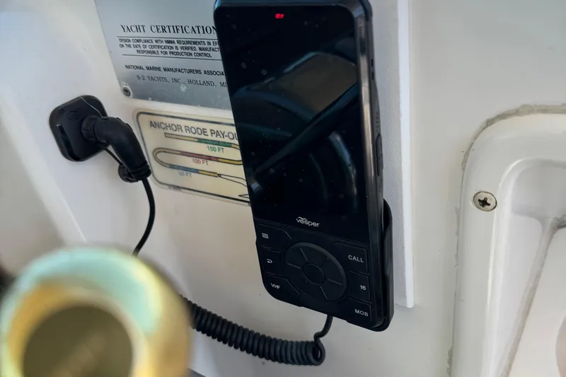 Dark And Stormy Yacht Photos Pics Vesper marine radio on 2000 Tiara Yachts 3500 Express, with yacht certification plaque.