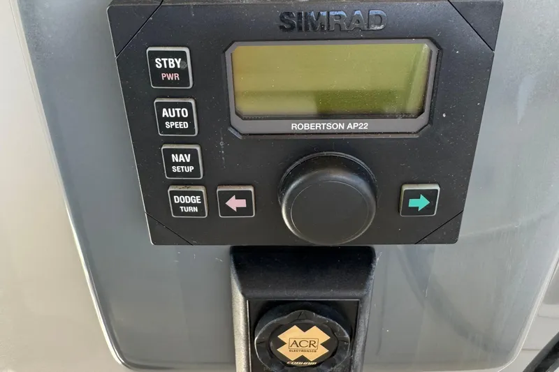 Dark And Stormy Yacht Photos Pics Simrad Robertson AP22 control panel on 2000 Tiara Yachts 3500 Express.