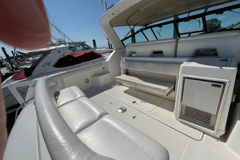Dark And Stormy Yacht Photos Pics 2000 Tiara Yachts 3500 Express boat interior with seating and storage.