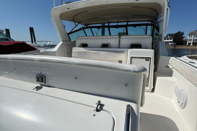 Dark And Stormy Yacht Photos Pics 2000 Tiara Yachts 3500 Express boat interior with seating and storage compartments.