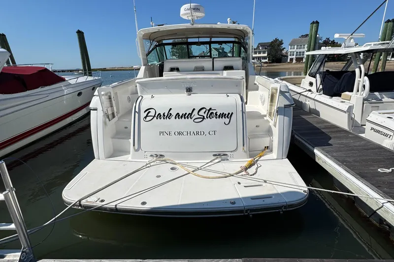 Dark And Stormy Yacht Photos Pics 2000 Tiara Yachts 3500 Express docked, named "Dark and Stormy," Pine Orchard, CT.