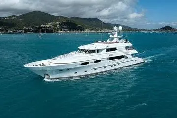 Batavia Yacht Photos Pics Luxurious 2003 Richmond Yachts 135 Motor Yacht cruising in turquoise waters.