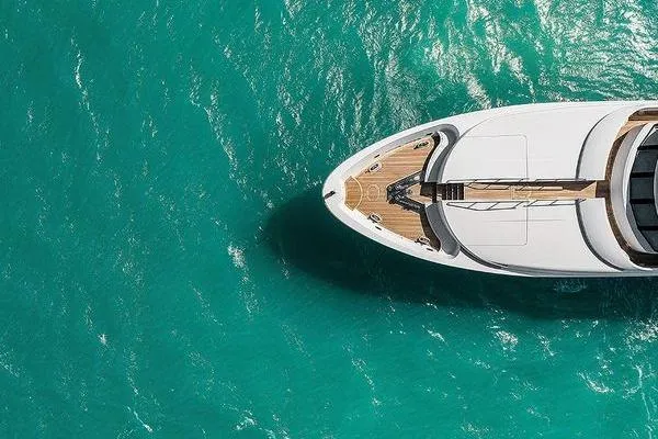 Batavia Yacht Photos Pics Aerial view of 2003 Richmond Yachts 135 Motor Yacht on turquoise water.