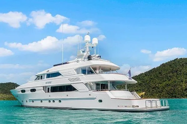 Batavia Yacht Photos Pics Luxurious 2003 Richmond Yachts 135 Motor Yacht cruising in clear blue waters.