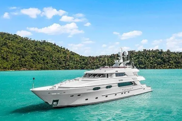 Batavia Yacht Photos Pics Luxurious 2003 Richmond Yachts 135 Motor Yacht cruising in turquoise waters.