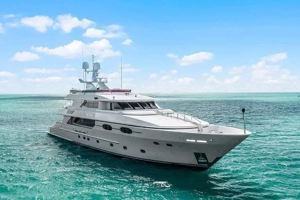 Batavia Yacht Photos Pics Luxurious 2003 Richmond Yachts 135 Motor Yacht cruising on clear blue waters.