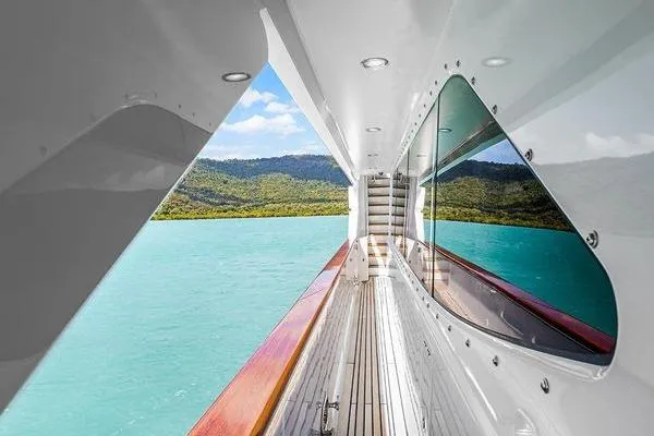 Batavia Yacht Photos Pics Luxurious Richmond Yachts 135 Motor Yacht corridor with scenic ocean and mountain view, 2003 model.