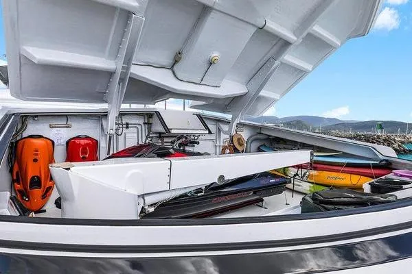 Batavia Yacht Photos Pics Storage compartment of 2003 Richmond Yachts 135 Motor Yacht with water sports equipment.