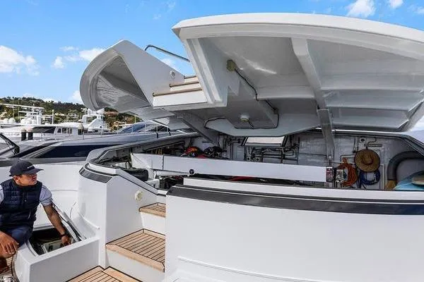 Batavia Yacht Photos Pics Open deck area of 2003 Richmond Yachts 135 Motor Yacht with storage compartments.