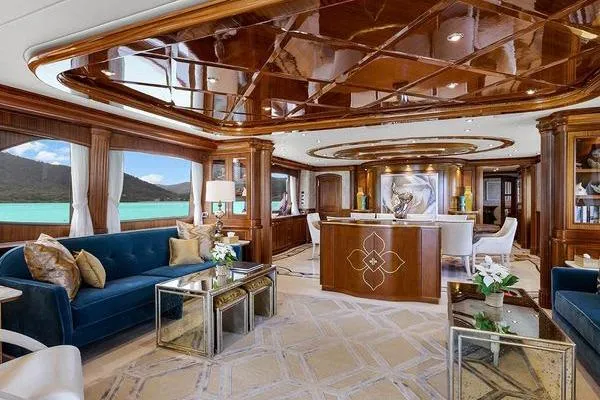Batavia Yacht Photos Pics Luxurious interior of 2003 Richmond Yachts 135 Motor Yacht with elegant wood finishes and plush seating.