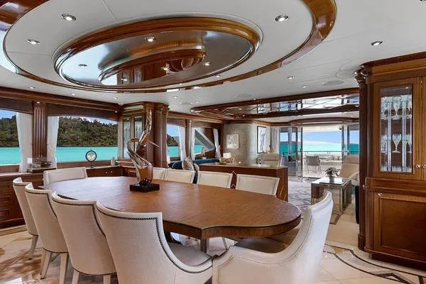 Batavia Yacht Photos Pics Luxurious interior of 2003 Richmond Yachts 135 Motor Yacht with elegant dining area and ocean view.