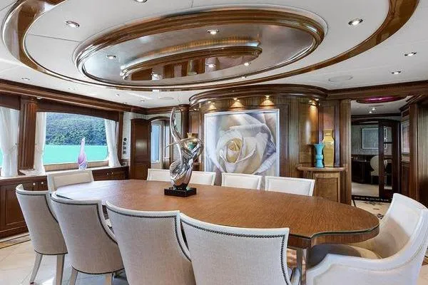 Batavia Yacht Photos Pics Luxurious dining area on 2003 Richmond Yachts 135 Motor Yacht with elegant decor and artwork.