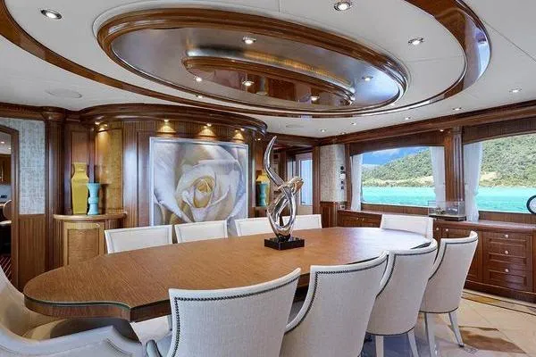 Batavia Yacht Photos Pics Luxurious dining area on 2003 Richmond Yachts 135 Motor Yacht with elegant decor and ocean view.