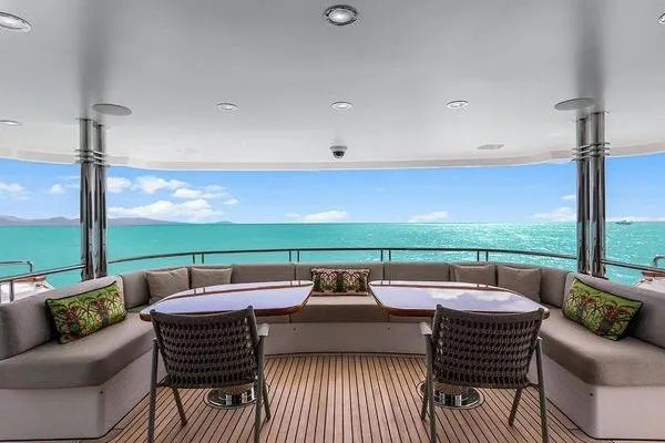 Batavia Yacht Photos Pics Luxurious Richmond Yachts 135 Motor Yacht 2003, featuring elegant outdoor seating with ocean view.