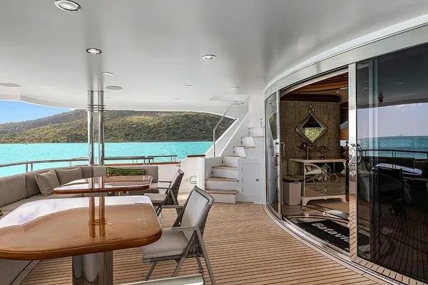 Batavia Yacht Photos Pics Luxurious Richmond Yachts 135 Motor Yacht deck with elegant seating, ocean view, and modern design.