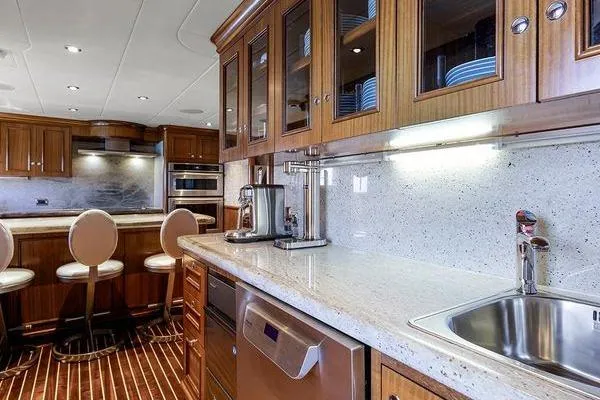 Batavia Yacht Photos Pics Luxurious kitchen interior of 2003 Richmond Yachts 135 Motor Yacht with modern amenities.