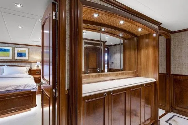 Batavia Yacht Photos Pics Luxurious Richmond Yachts 135 Motor Yacht interior, featuring elegant wood cabinetry and a cozy bedroom, 2003 model.