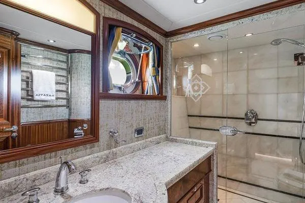 Batavia Yacht Photos Pics Luxurious bathroom on 2003 Richmond Yachts 135 Motor Yacht with elegant fixtures and glass shower.