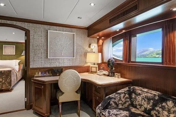 Batavia Yacht Photos Pics Luxurious interior of 2003 Richmond Yachts 135 Motor Yacht with elegant desk and scenic window view.