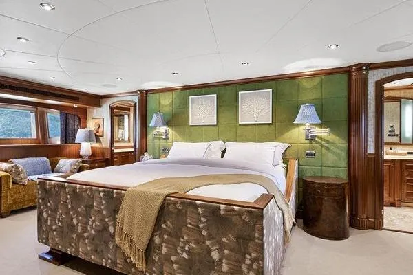 Batavia Yacht Photos Pics Luxurious bedroom interior of 2003 Richmond Yachts 135 Motor Yacht with elegant decor and plush furnishings.