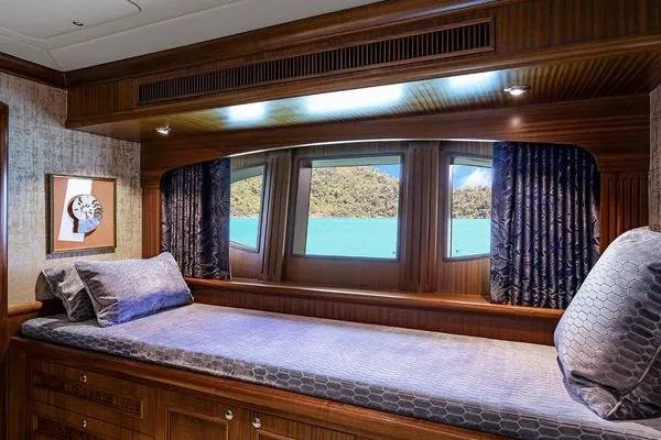 Batavia Yacht Photos Pics Luxurious cabin interior of 2003 Richmond Yachts 135 Motor Yacht with scenic window view.
