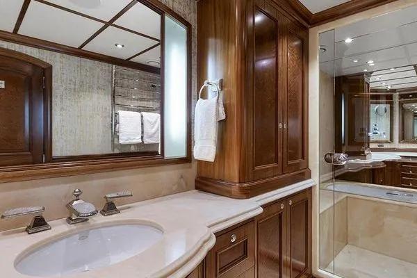 Batavia Yacht Photos Pics Luxurious bathroom in 2003 Richmond Yachts 135 Motor Yacht with elegant wood cabinetry.