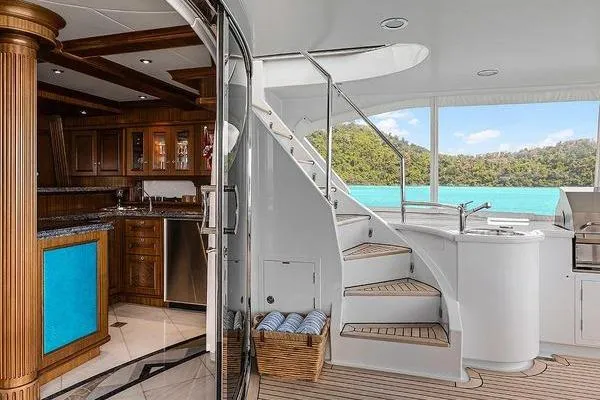 Batavia Yacht Photos Pics Luxurious interior of 2003 Richmond Yachts 135 Motor Yacht with elegant wood finishes.