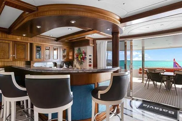 Batavia Yacht Photos Pics Luxurious interior of 2003 Richmond Yachts 135 Motor Yacht with elegant bar and ocean view.