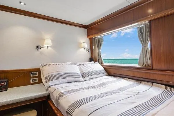Batavia Yacht Photos Pics Luxurious bedroom interior of 2003 Richmond Yachts 135 Motor Yacht with ocean view.