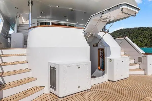 Batavia Yacht Photos Pics Luxurious Richmond Yachts 135 Motor Yacht deck, 2003 model, featuring elegant wood and sleek design.