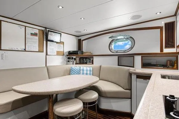 Batavia Yacht Photos Pics Luxurious interior of 2003 Richmond Yachts 135 Motor Yacht with elegant seating and modern amenities.