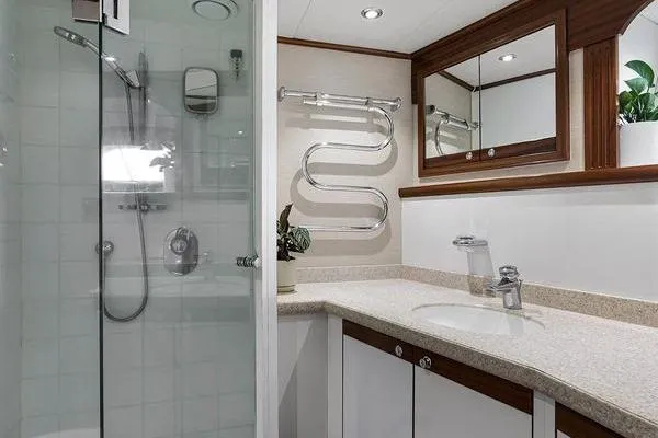 Batavia Yacht Photos Pics Luxurious bathroom on 2003 Richmond Yachts 135 Motor Yacht with modern shower and elegant fixtures.