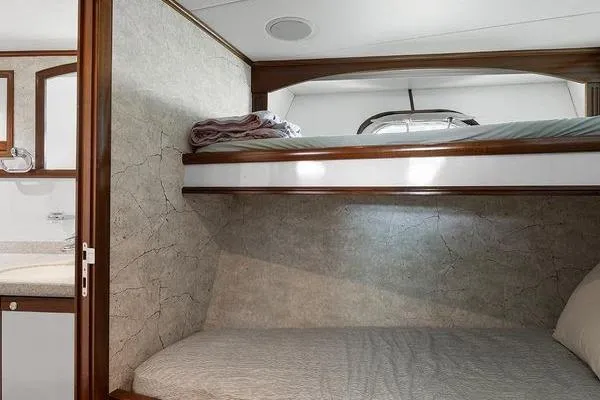 Batavia Yacht Photos Pics Bunk beds in Richmond Yachts 135 Motor Yacht, 2003 model, with elegant wood trim.