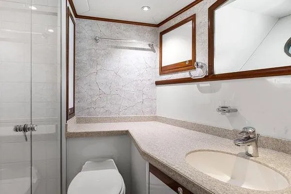 Batavia Yacht Photos Pics Luxurious bathroom in 2003 Richmond Yachts 135 Motor Yacht with elegant fixtures.