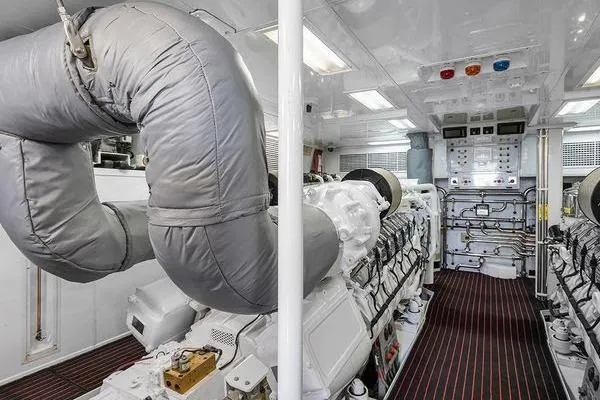 Batavia Yacht Photos Pics Engine room of 2003 Richmond Yachts 135 Motor Yacht, featuring advanced machinery and control panels.