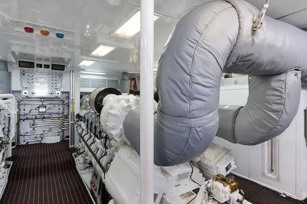 Batavia Yacht Photos Pics Engine room of 2003 Richmond Yachts 135 Motor Yacht, featuring advanced machinery and piping.