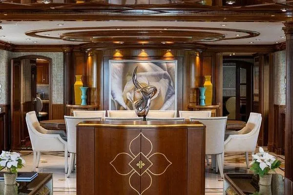 Batavia Yacht Photos Pics Luxurious interior of 2003 Richmond Yachts 135 Motor Yacht with elegant dining area and artwork.