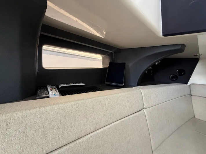  Yacht Photos Pics Interior of 2017 Boston Whaler 420 Outrage, featuring a cozy seating area and modern amenities.