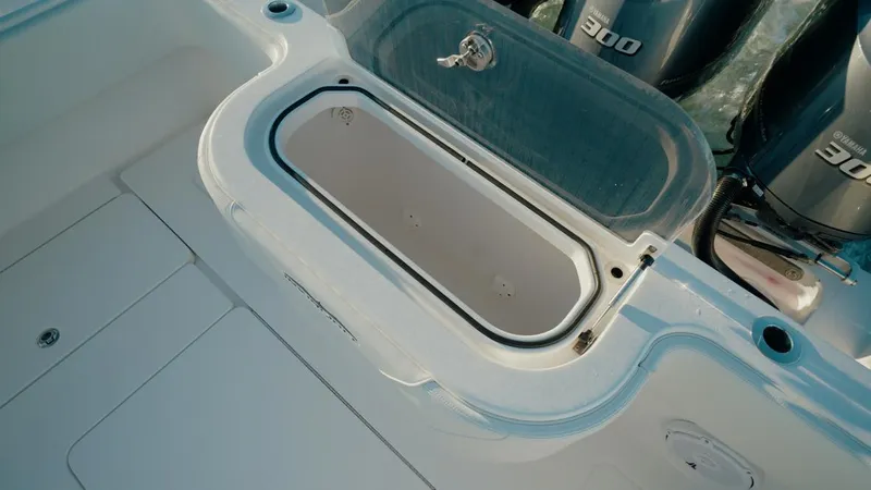 End Game Yacht Photos Pics 2020 Invincible 36 CC boat with open storage compartment and powerful engines.